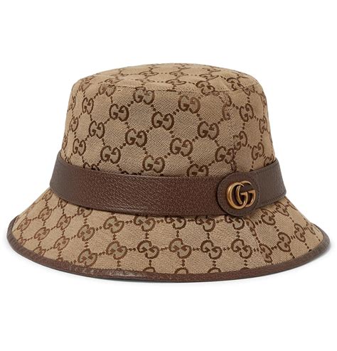 gucci hat cost of production